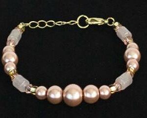 Pink glass pearl and rose quartz bead bracelet.