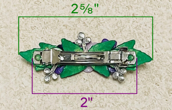 Purple clay flowers barrette with rhinestones and green leaves back side measurements.