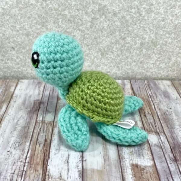 Sea Turtle with pistachio color shell side view